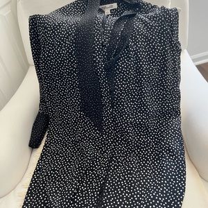 A silk black/white button-down Diane Von Furstenberg dress + wrap-around belt.